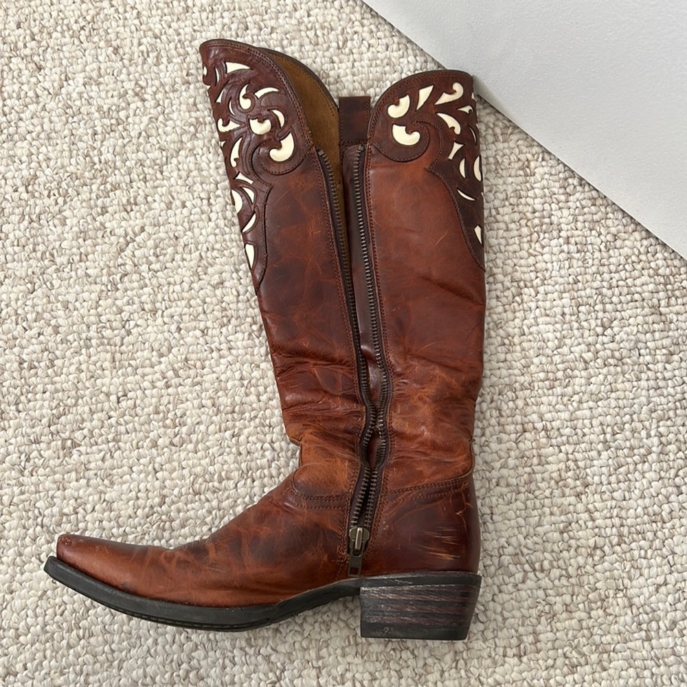 Ariat tall boots.